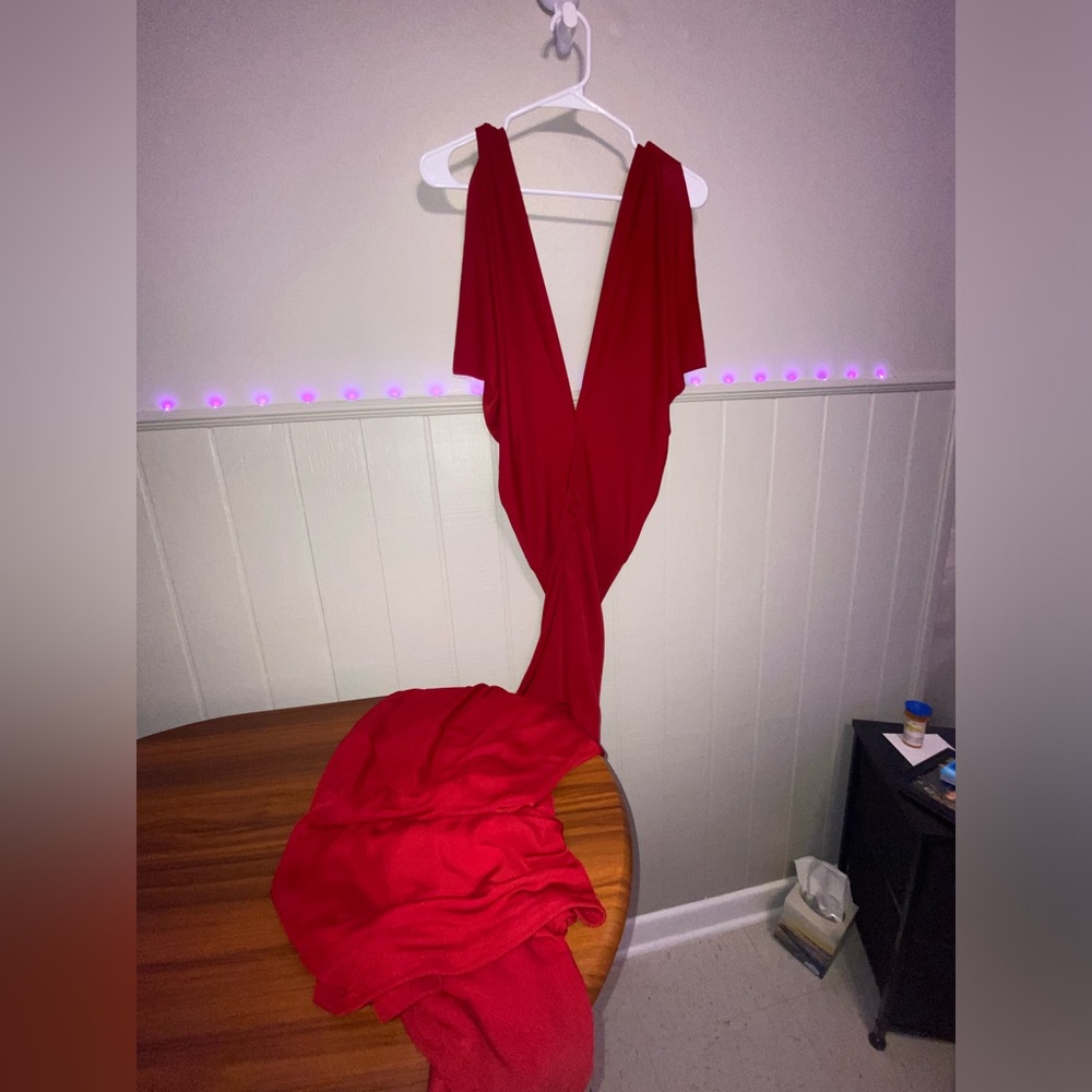 Red dress with a slit, mermaid tail.